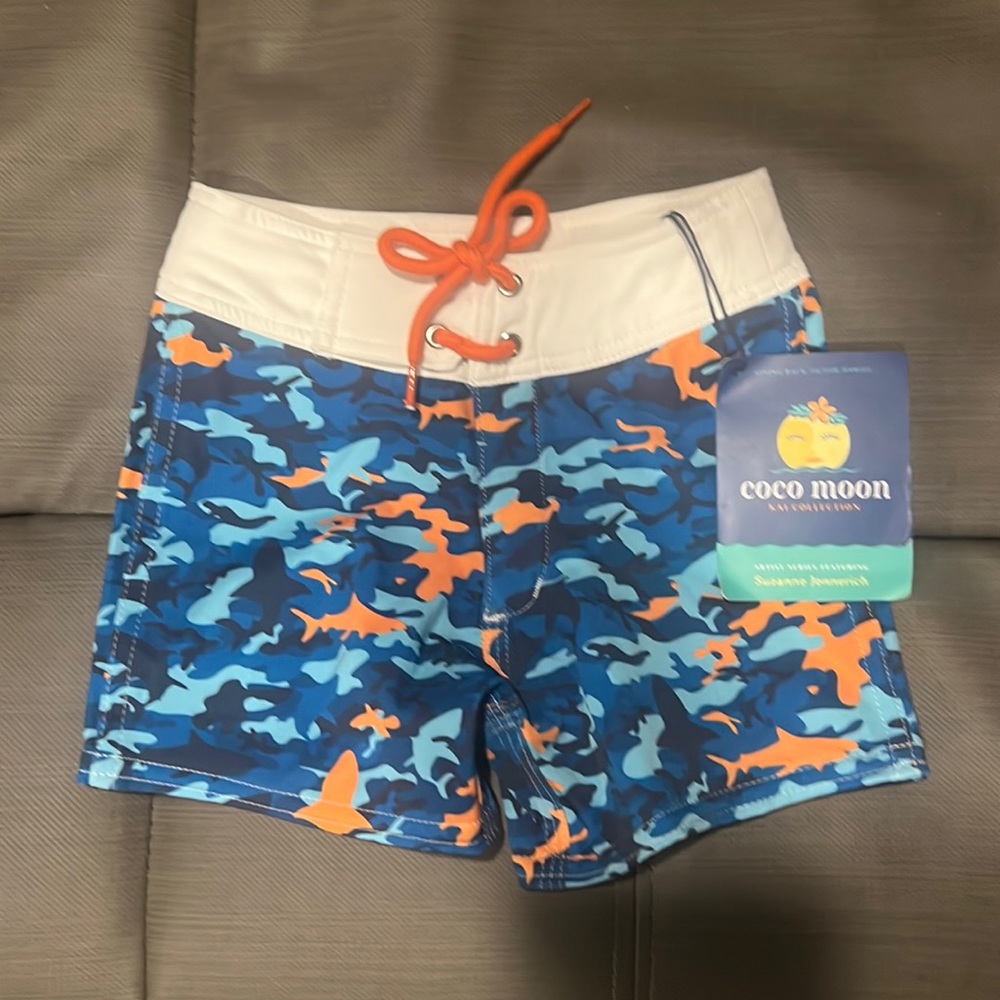 Brand new with tags Cocomelon swim trunks 6 to 12 months